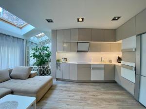 A kitchen or kitchenette at Garbarska LUX with Air Condition