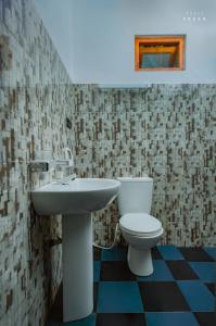 Ванная комната в Hotel Athina & Restaurant