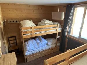 Postel nebo postele na pokoji v ubytování Appartement plein sud, au pied des pistes, vue imprenable