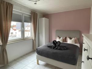Cama o camas de una habitación en Wohnen beim Brotsommelier - Frankenlaib