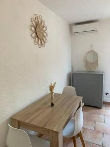 Posedenie v ubytovaní Maison dans lotissement