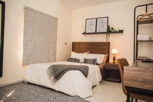 מיטה או מיטות בחדר ב-Exquisite 2 Bedroom Apartment in Lekki phase 1