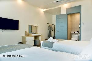 Letto o letti in una camera di Cube9 Resort & Spa 큐브9 리조트 & 스파