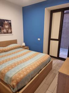 A bed or beds in a room at GG apartaments