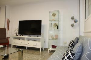 Et tv og/eller underholdning på Apartamento Boutique Cruce de Melenara + 6 billeder