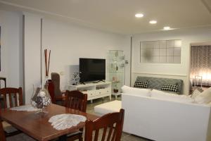 Et tv og/eller underholdning på Apartamento Boutique Cruce de Melenara