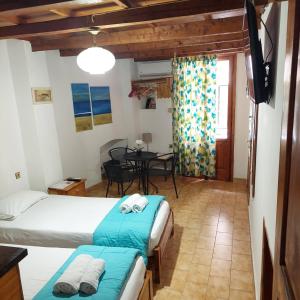 Postel nebo postele na pokoji v ubytování Guesthouse Chryssoula