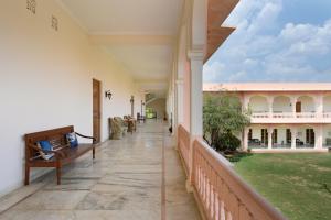 an empty hallway of a house with a yard at Dev Vilas in Sawāi Mādhopur