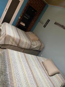 Postel nebo postele na pokoji v ubytování Hermoso Huehueloft 3 Wi-Fi