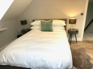 Ένα ή περισσότερα κρεβάτια σε δωμάτιο στο Luxury 2 bed home