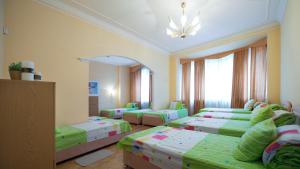 Postel nebo postele na pokoji v ubytování Lviv Euro Hostel