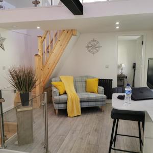 Гостиная зона в AnchorageWells Lodge, Seaview Apartment