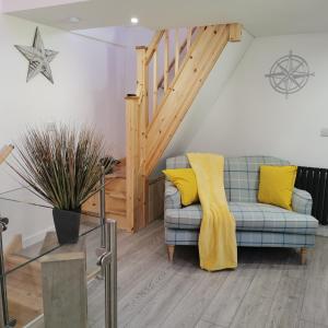 Гостиная зона в AnchorageWells Lodge, Seaview Apartment