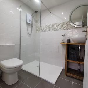 Ванная комната в AnchorageWells Lodge, Seaview Apartment