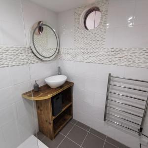 Ванная комната в AnchorageWells Lodge, Seaview Apartment