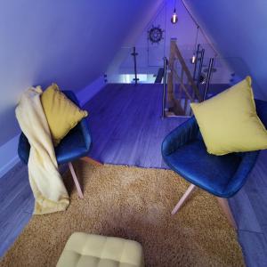 Гостиная зона в AnchorageWells Lodge, Seaview Apartment