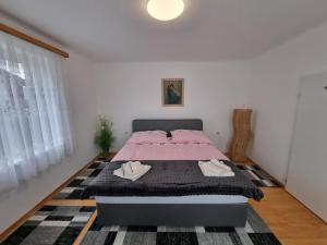 Voodi või voodid majutusasutuse Pension DonauBlick Grein 1 , Spitzfeldstr 1 toas