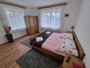 Voodi või voodid majutusasutuse Pension DonauBlick Grein 1 , Spitzfeldstr 1 toas