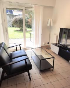 Posedenie v ubytovaní Ty Cocoon- Appartement avec terrasse et parking privé