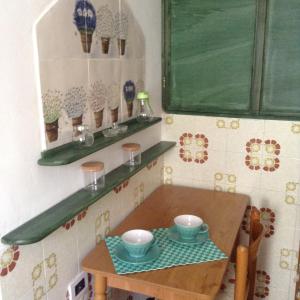 a small table with two bowls on top of it at Casa SILVIO in Sesta Godano