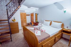 Voodi või voodid majutusasutuse Hotel Pharos toas