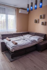 Postel nebo postele na pokoji v ubytování Viva Apartman