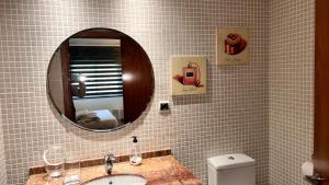 Koupelna v ubytování Apartamentos LOS TULIPANES + 11 fotografií
