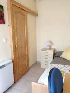 Łóżko lub łóżka w pokoju w obiekcie Chalet en Valle del Tietar