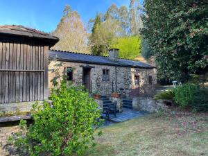 Jardín al aire libre en Casa Rural O Vilar