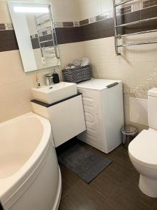 Koupelna v ubytování "Aš Centre" apartamentai