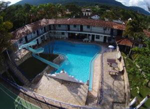 an overhead view of a swimming pool in a house at Hotel Ponta do Morro in Tiradentes