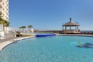 uma grande piscina com um gazebo em Summer House 703B by ALBVR - Great Beachfront Condo with Oversized Balcony & Amazing Views! em Orange Beach