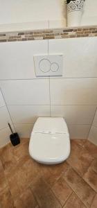 Ένα μπάνιο στο Ferienwohnung Andrea +8 φωτογραφίες