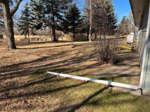 a house with a tape around a yard at Hunters Haven in Kimball
