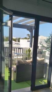 Balkón nebo terasa v ubytování Casa Mykonos 1° linea de mar en Playa Blanca