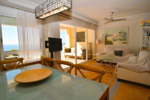 Posedenie v ubytovaní Beach & Golf seafront house Campoamor Alicante