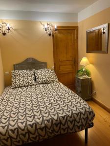 Ένα ή περισσότερα κρεβάτια σε δωμάτιο στο La Palud