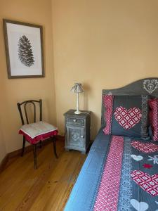 Ένα ή περισσότερα κρεβάτια σε δωμάτιο στο La Palud +5 φωτογραφίες