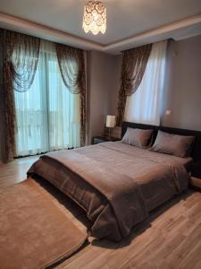 Postel nebo postele na pokoji v ubytování Trabzon Sunset House