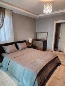 Postel nebo postele na pokoji v ubytování Trabzon Sunset House