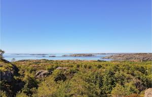 a view of the ocean from a bluff at Holiday Home Finnås Lyklingsjøvegen in Lykling