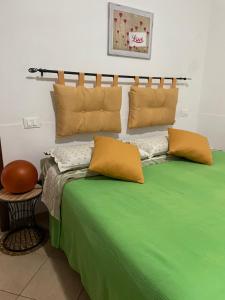 מיטה או מיטות בחדר ב-Teramo Garibaldi's Sweet Home
