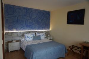 Posteľ alebo postele v izbe v ubytovaní Hotel Sant Joan