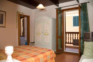 Voodi või voodid majutusasutuse B&B Vecchia Alghero toas