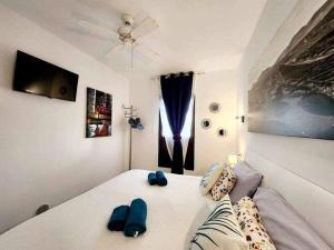 A bed or beds in a room at El ron ron de Fuerte