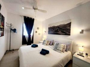 A bed or beds in a room at El ron ron de Fuerte