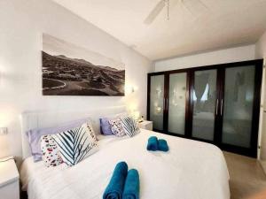A bed or beds in a room at El ron ron de Fuerte