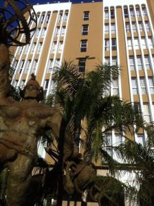 a large building with a statue of an elephant in the middle of it at Hotel Continental Porto Alegre e Centro de Eventos in Porto Alegre