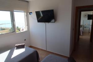 Telewizja i/lub zestaw kina domowego w obiekcie EL REMANSO IV