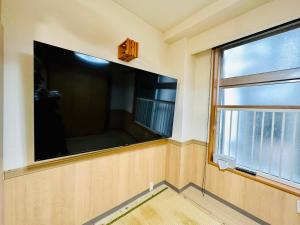TV o dispositivi per l'intrattenimento presso MoRi House IN 伊勢佐木町